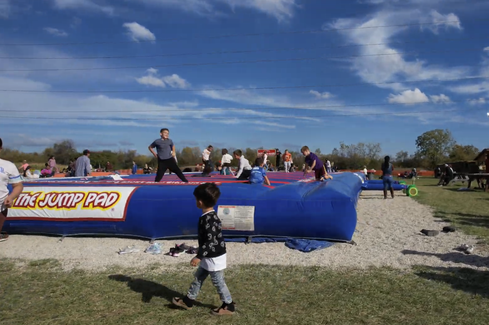 Kids bouncing on the Jump Pad